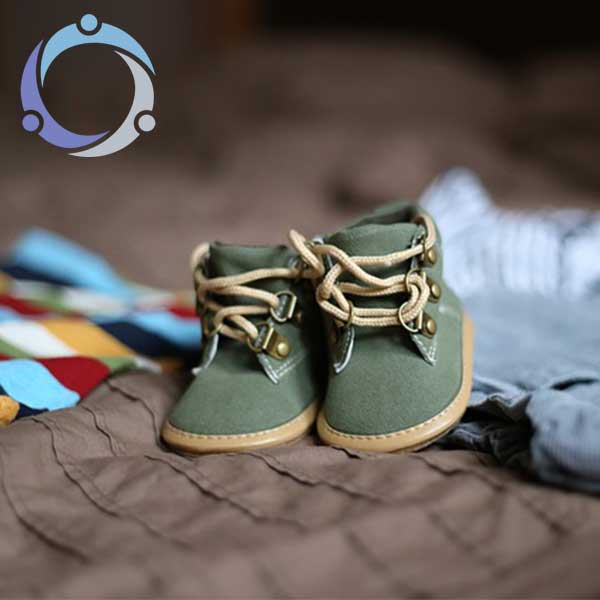 A pair of baby shoes is one of many gift ideas for new moms.