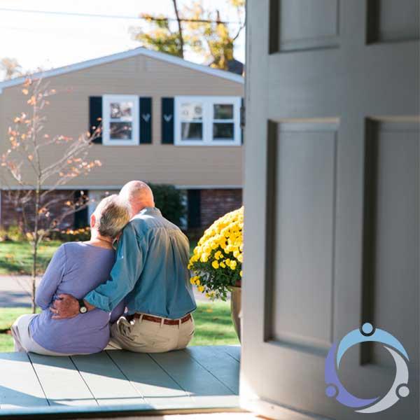 As two seniors sit on the front porch of their daughters house, the daughter realizes she had become an in home caregiver.