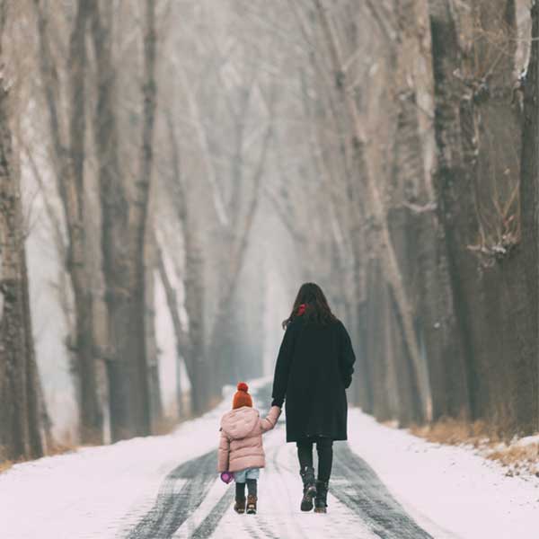 A mother and daughter walk alone and try to find find help for single moms.